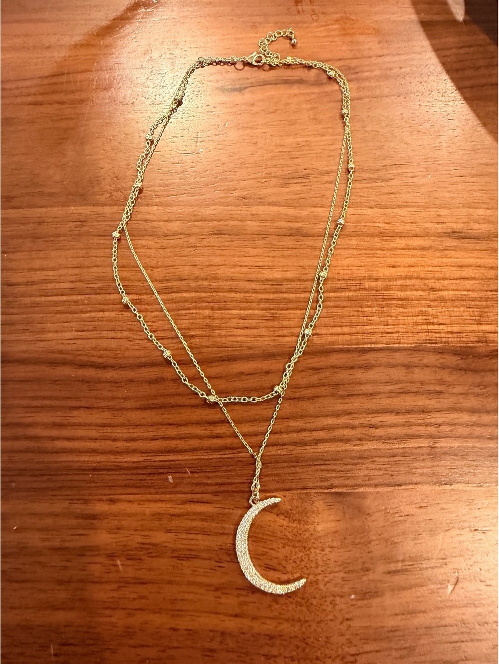 Gold Tone Layered Necklace with Crescent Moon Pendant